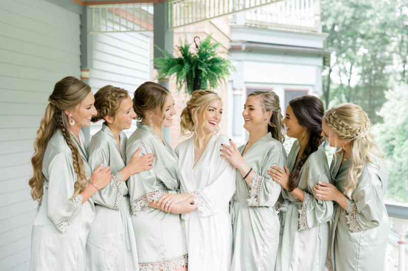 bridal party taking photos outside