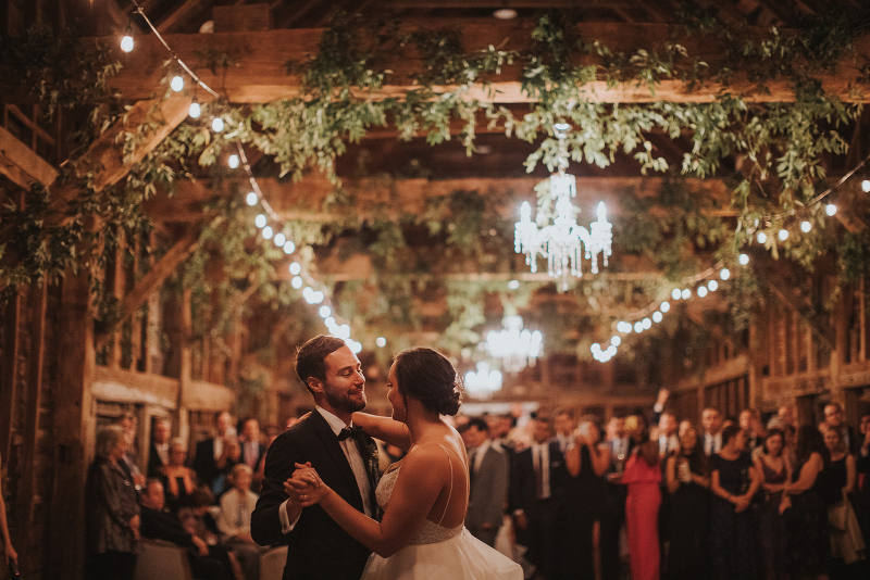 Large wedding ceremony with bride and groom dancing