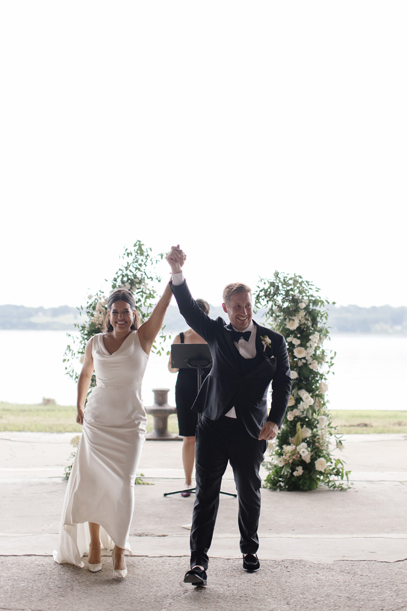 bride and groom celebrate after the wedding ceremony
