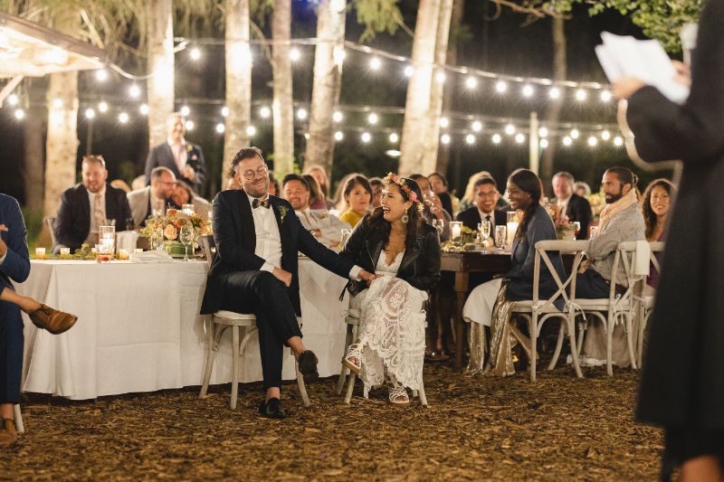 string lighting over evening wedding reception