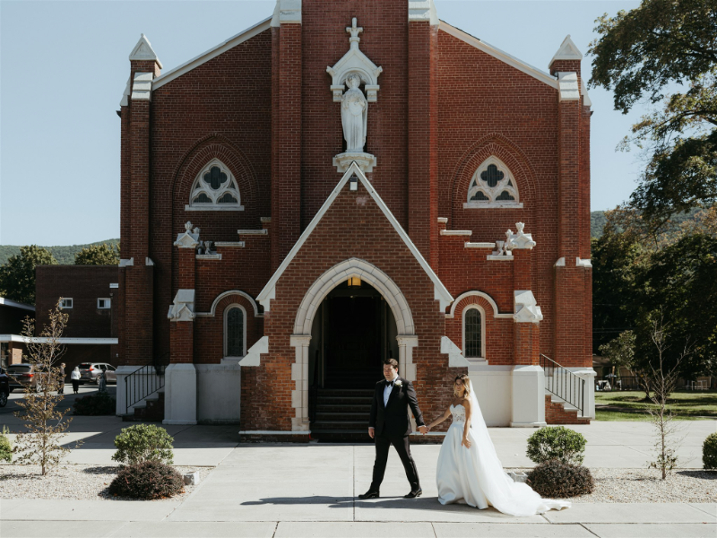 bride and groom outside church ceremony