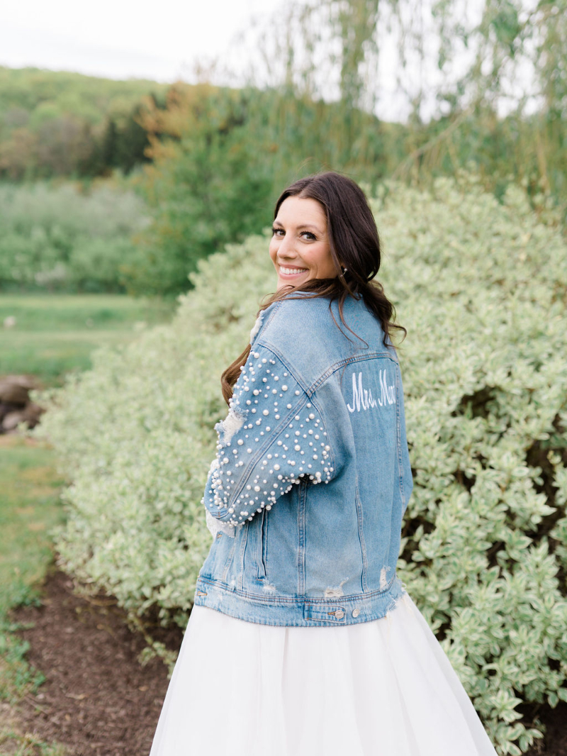 Hudson Valley winery wedding photos of bride in jean jacket