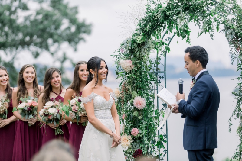 Burgundy and white wedding flowers during fall wedding ceremony