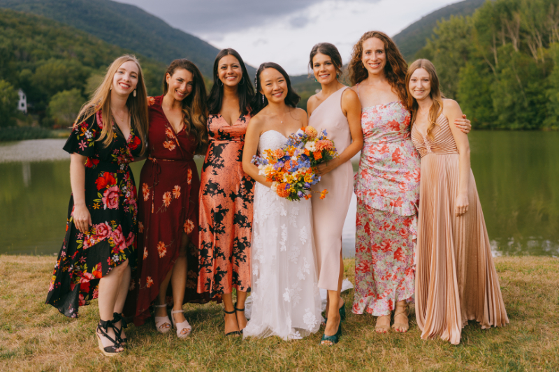 patterned bridesmaid dresses in red wedding color palette