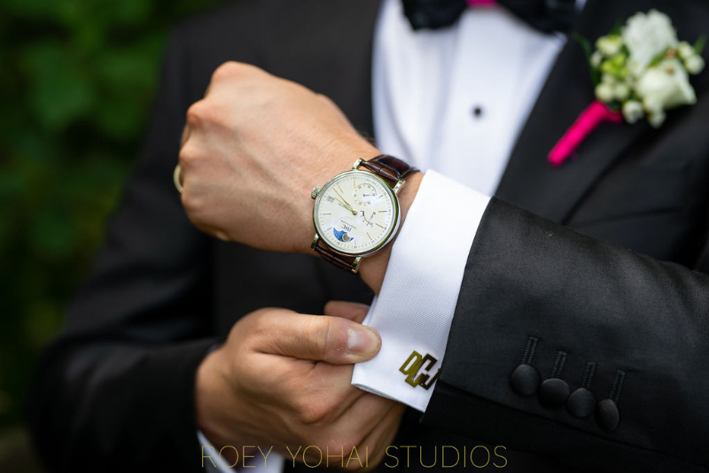 closeup of groom cufflinks