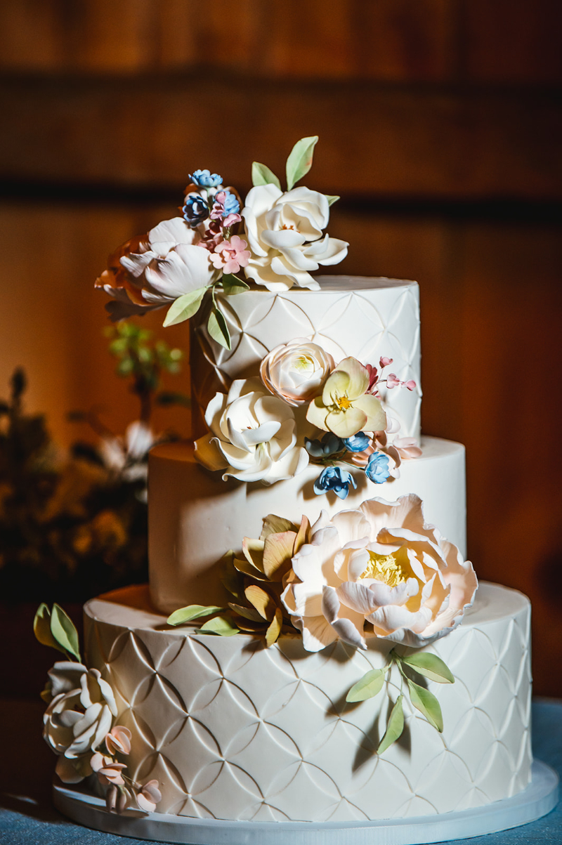white wedding cake with flowers