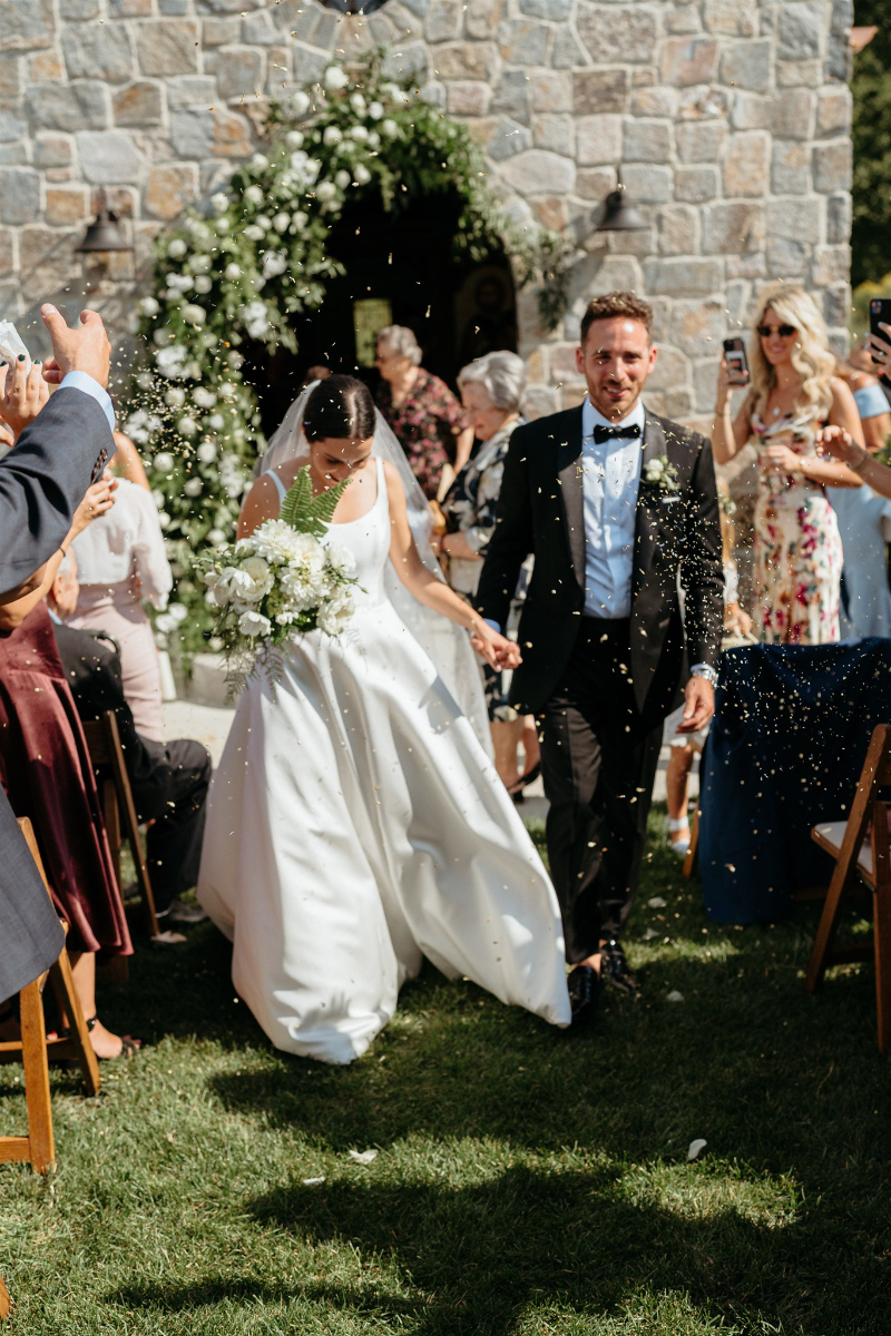wedding recessional photo of bride and groom exiting church