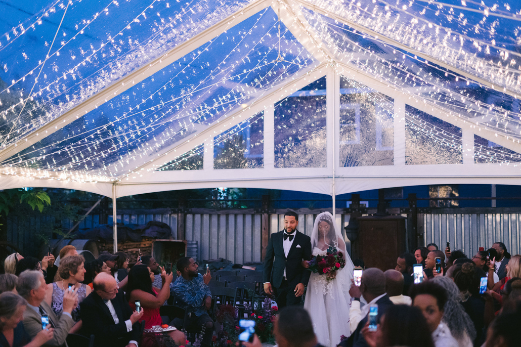 Outdoor wedding tent for at home wedding or backyard wedding with string lighting