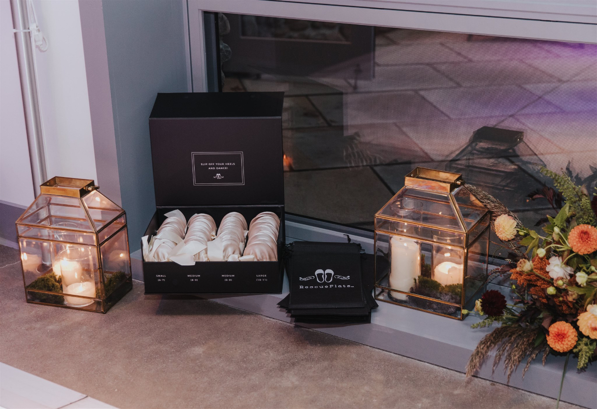 A 'dancing shoes' station offering guests comfy footwear to keep the party going on the dance floor.