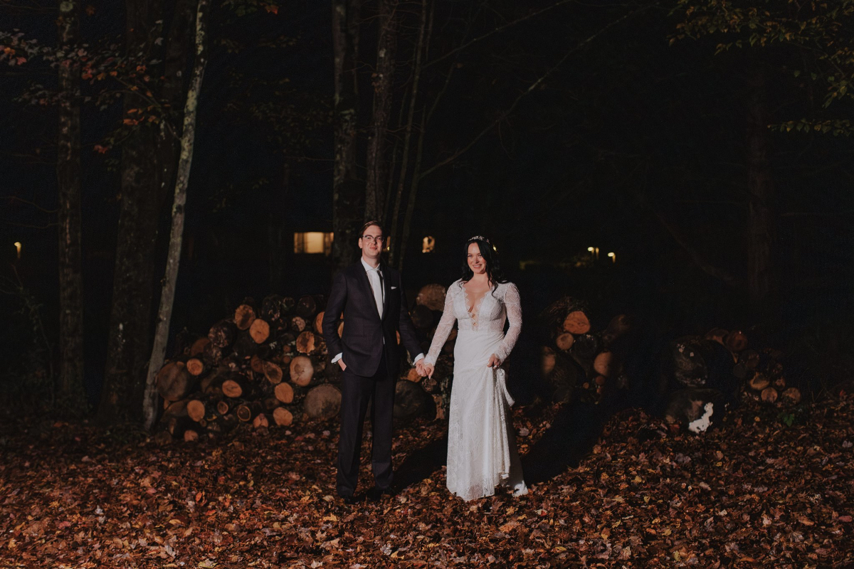 Emily and Greg taking romantic nighttime photos under the stars