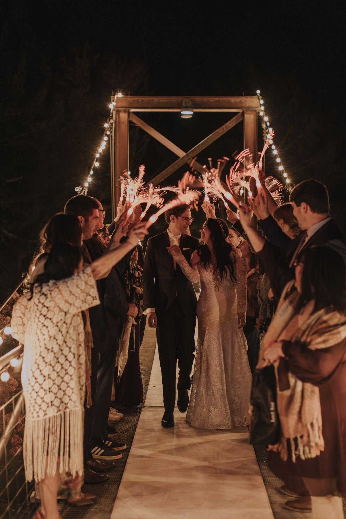 The newlyweds’ joyful sprinkler send-off,