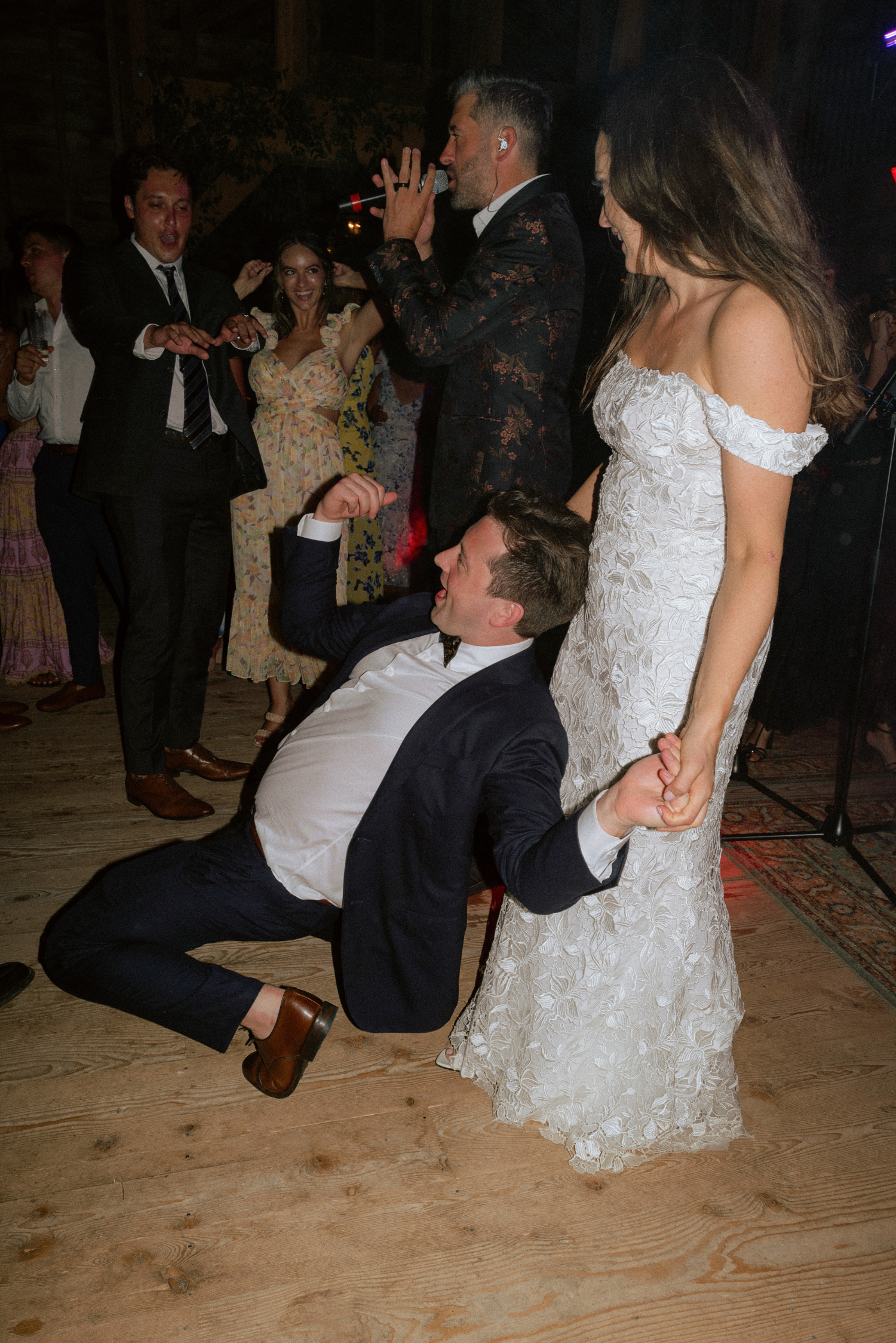 wedding reception dance portion for barn wedding features groom and bride 