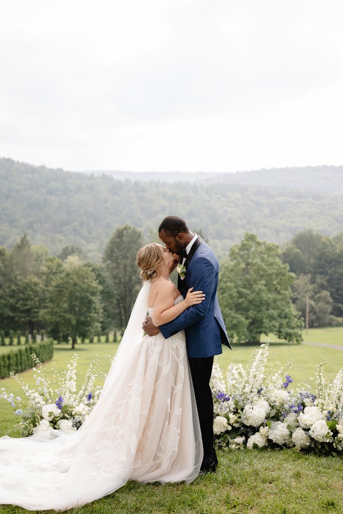bride and groom kissing at their ceremony
