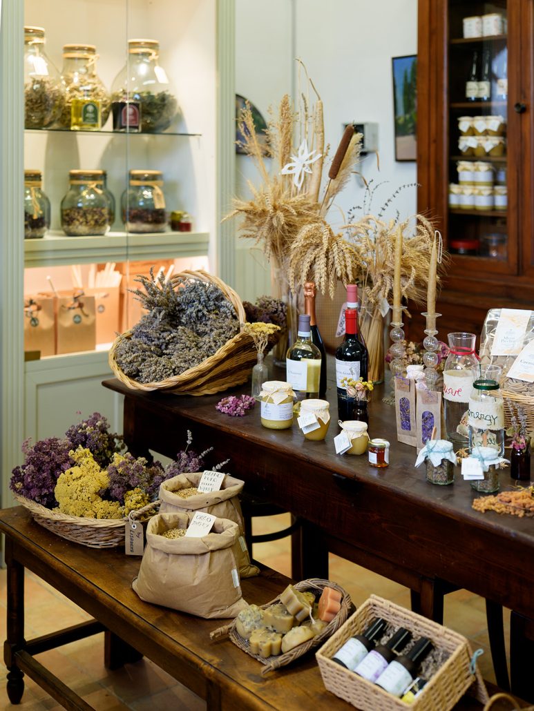 Local artisan shop at Borgo Pignano with lavender, wine, and handmade goods, adding authentic Tuscan charm to weddings.