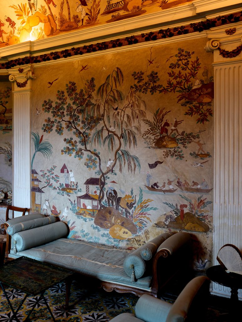 Ornate frescoed salon inside Villa Medicea di Lilliano with hand-painted walls and antique furniture, ideal for luxury Tuscany weddings.