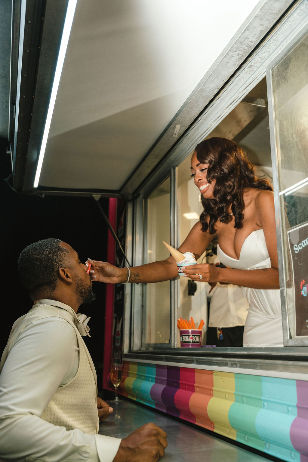 Ice cream truck serving guests as a playful late-night wedding treat.