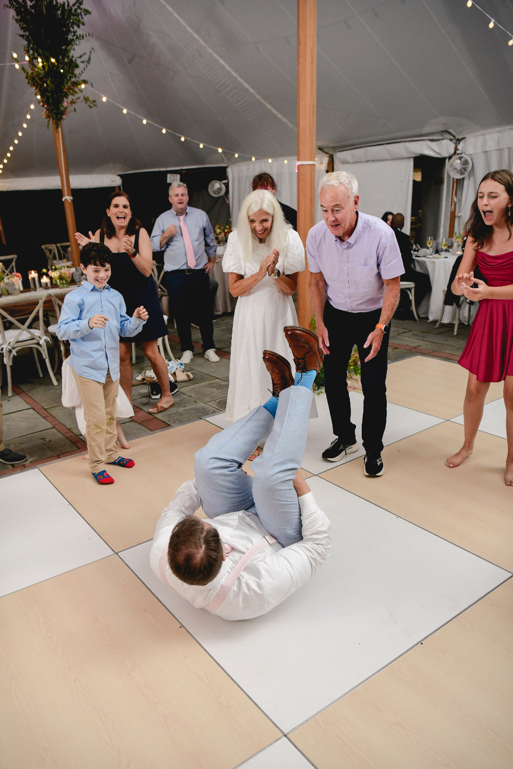 Guests celebrating on the dance floor during a Buttermilk Falls Inn wedding.