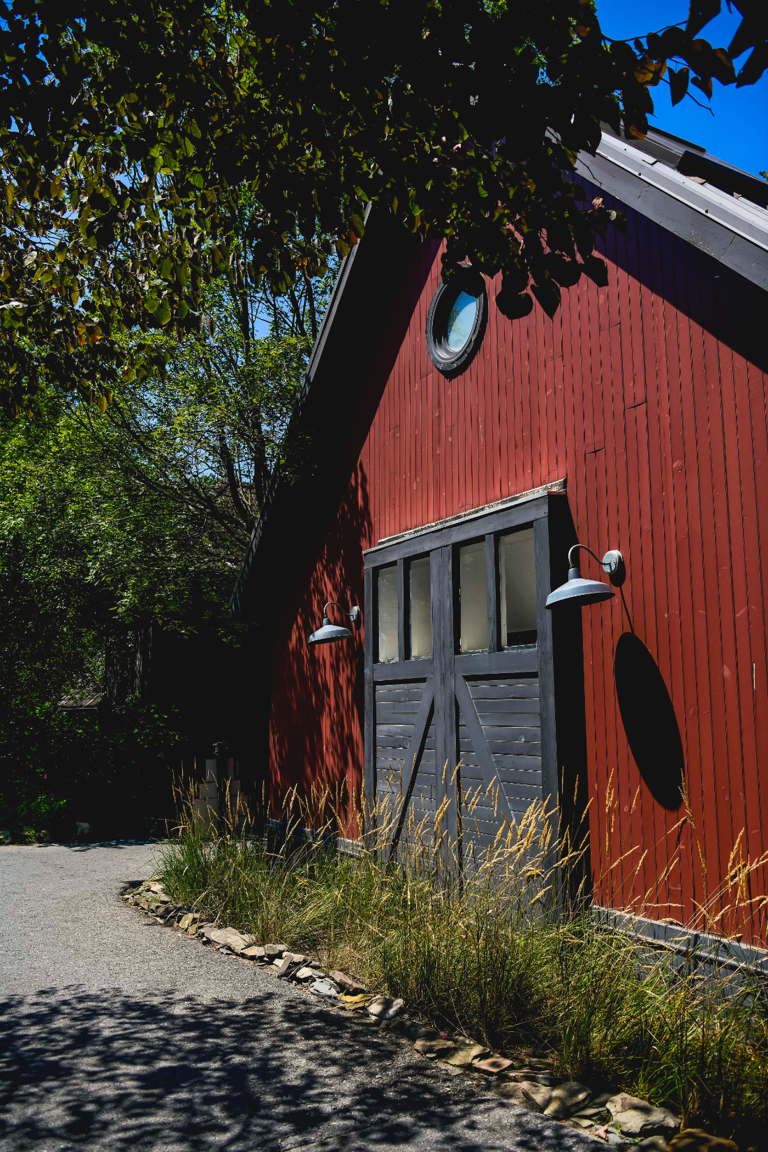 Rustic red barn on the property used during a buttermilk falls inn wedding weekend.