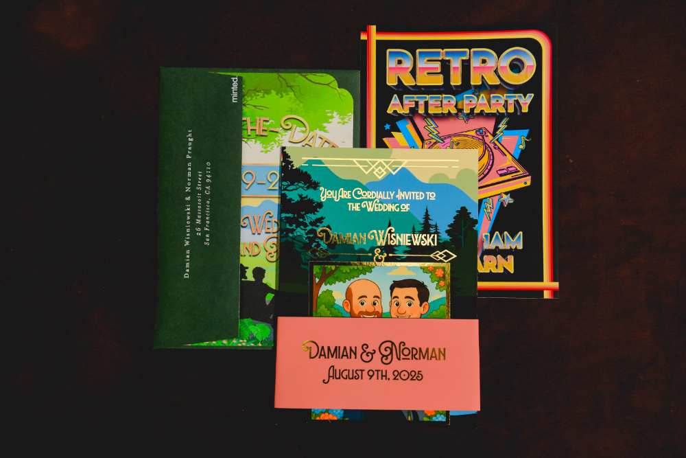 A colorful invitation suite with art-deco and retro details for Norman and Damian’s Buttermilk Falls Inn wedding.
