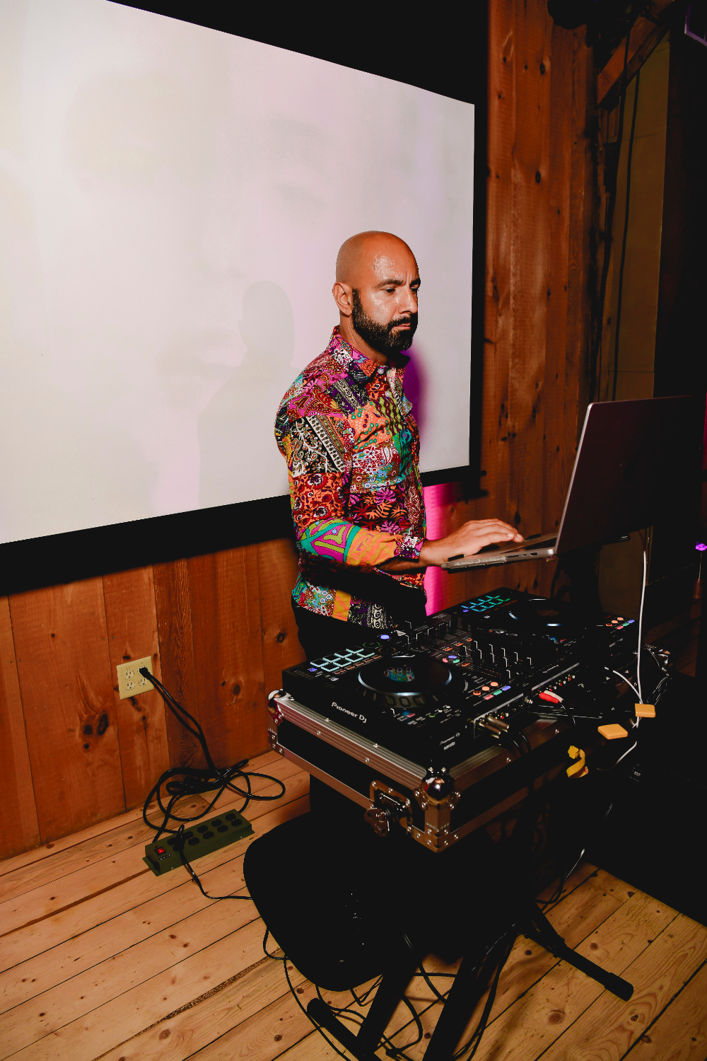 The DJ spinning 80s classics at the Buttermilk Falls Inn wedding after party.