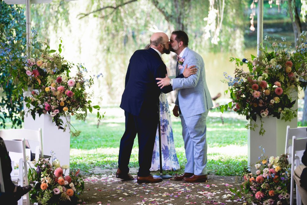 couple kiss during ceremony in New York