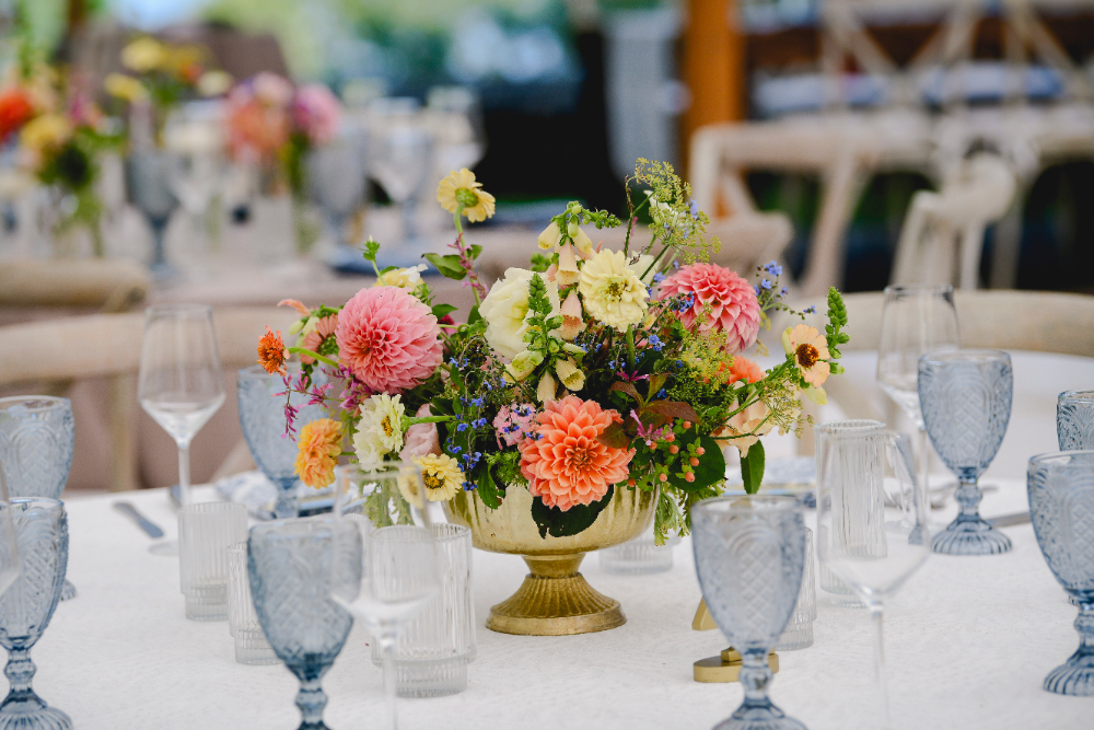 A detailed look at fresh garden-style florals in soft peach and blue tones.
