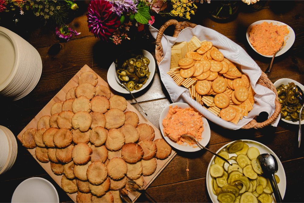 Late-night snacks arranged on a table for guests at the after-party.