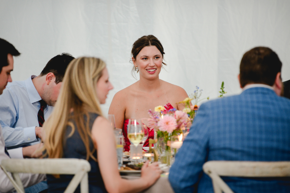 guests smiling at having fun durning Milton New York wedding