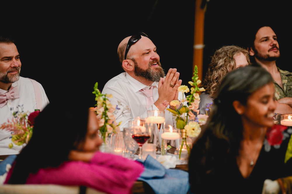 groom loving the speech at his New York wedding.