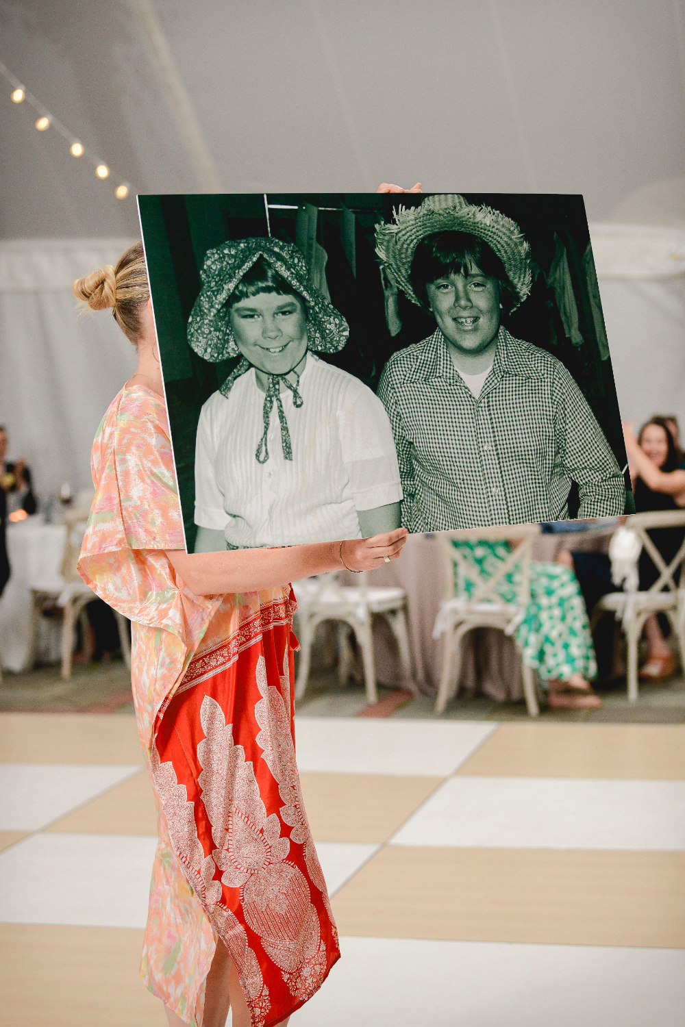 A cherished old snapshot of the couple shown as part of the wedding décor.