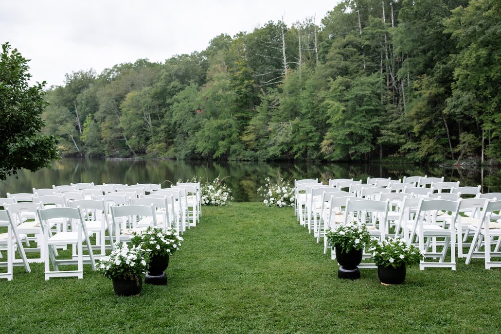 Ceremony setup near the lake at a private residence wedding