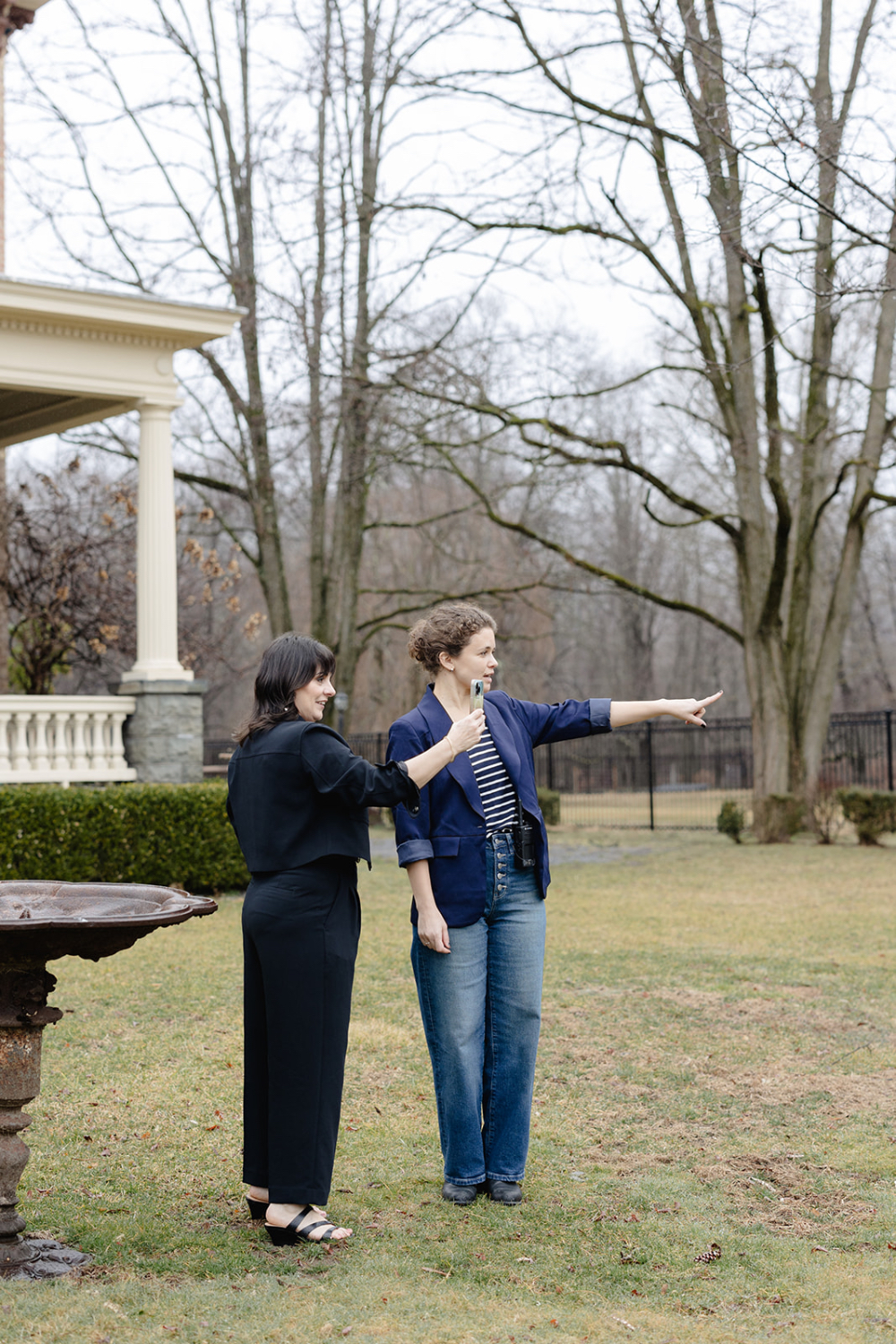 Event planners reviewing layout and logistics for a private estate home wedding in New England