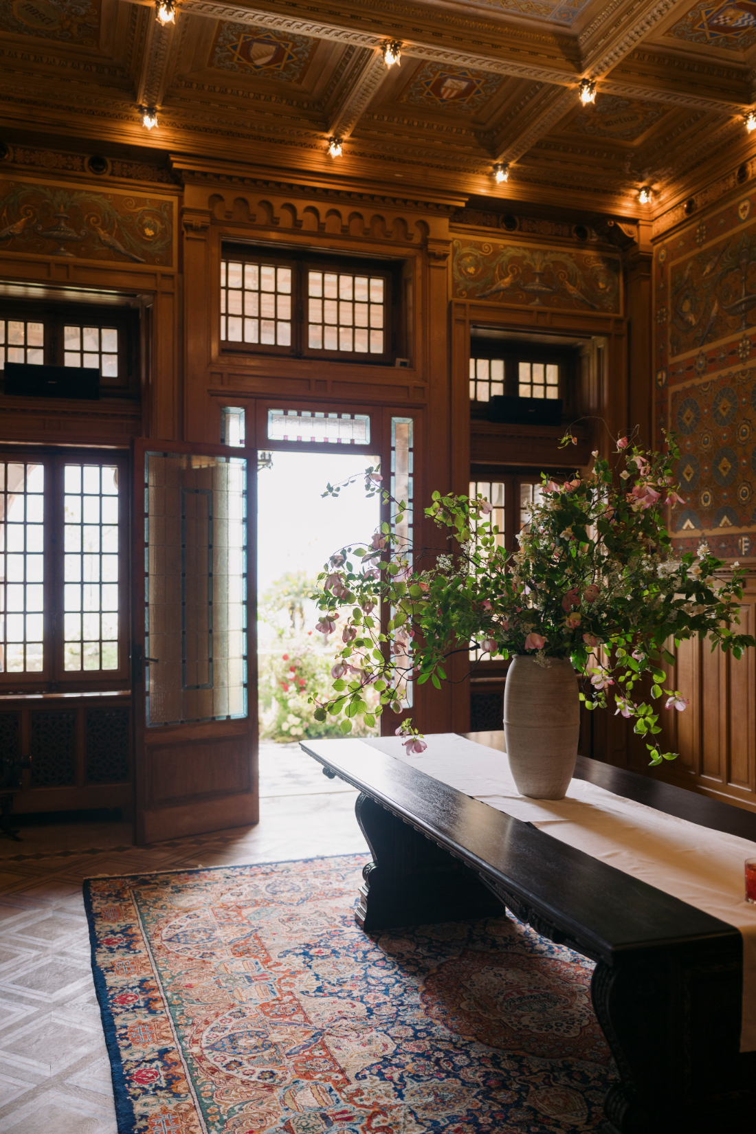 Historic wooden entrance hall decorated for a luxury wedding