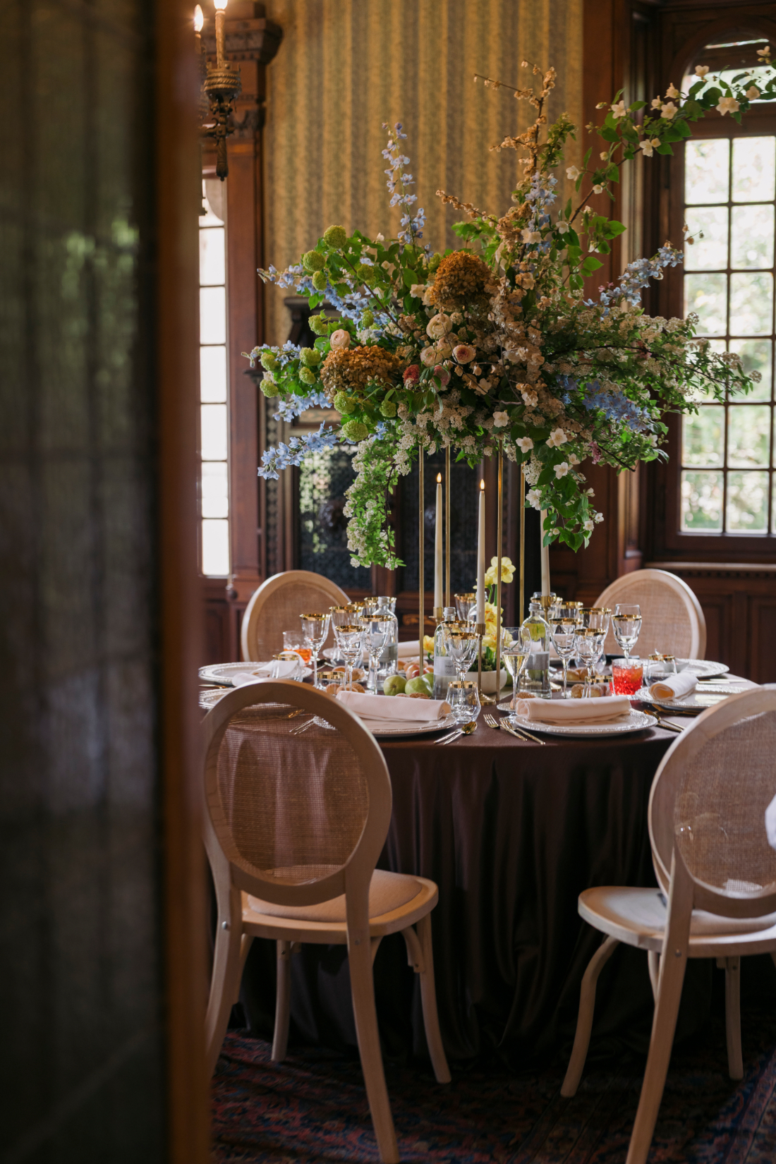 Tall floral centrepiece decorating the reception room at Villa Pessina Lake Como