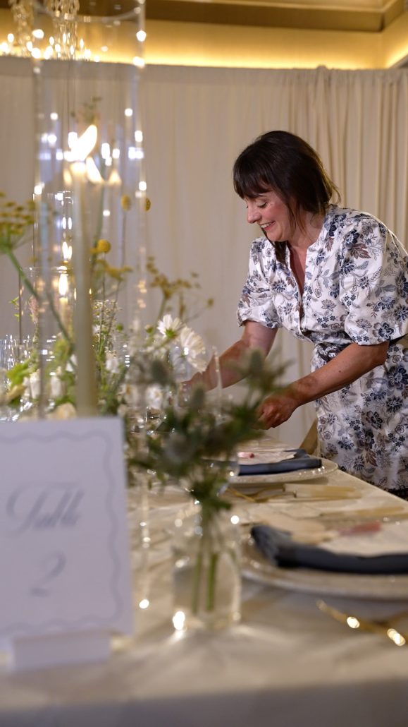 Christofora Events putting the finishing touches on an elegant dinner table at Mirbeau Beacon