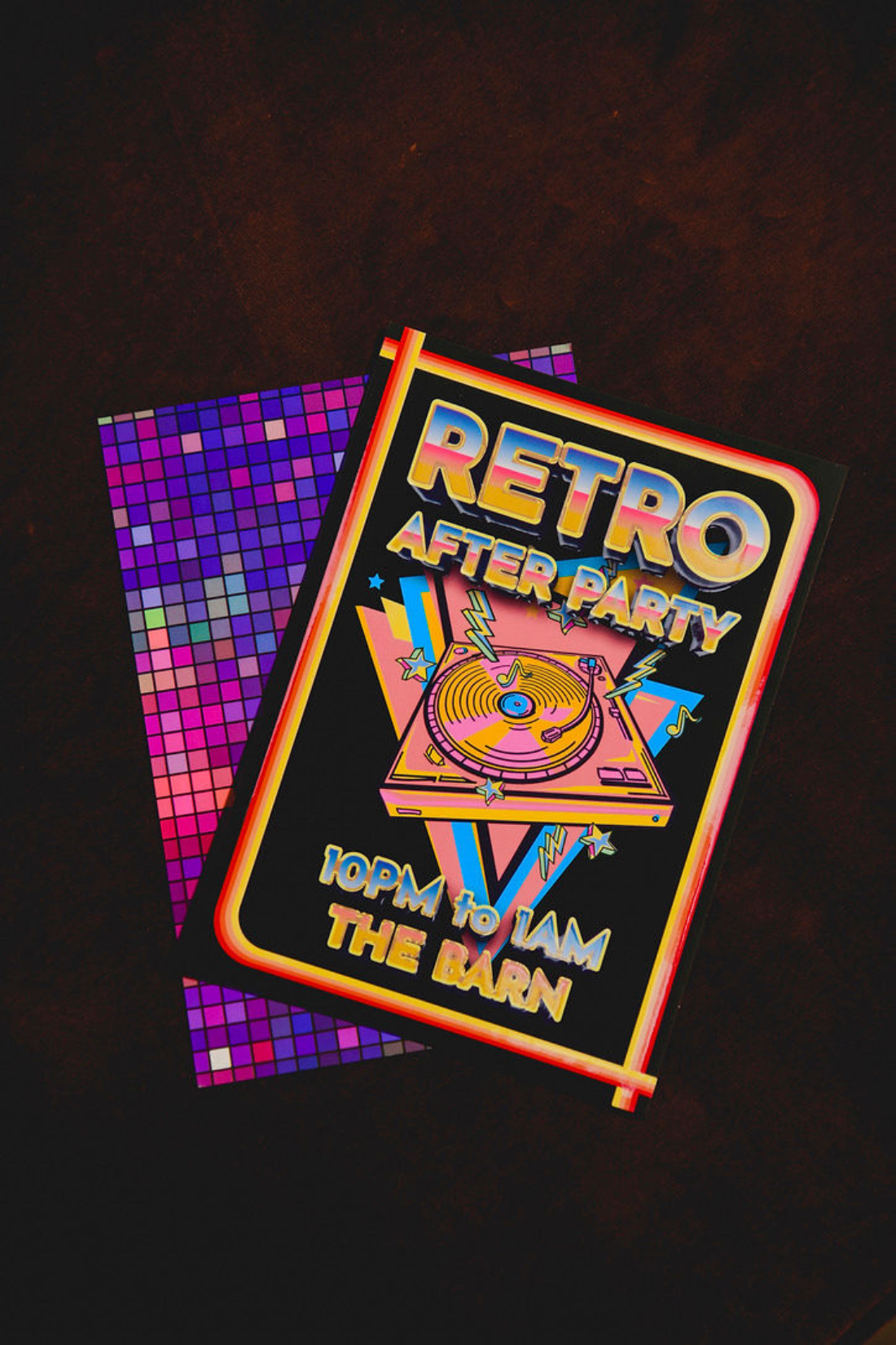 Wedding after party ideas featuring colorful retro-inspired signage directing guests to a late-night barn celebration.