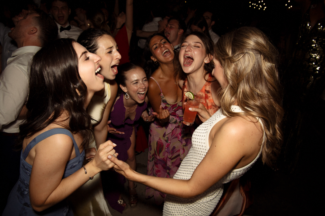 Wedding after party ideas with guests dancing and celebrating together late into the evening.