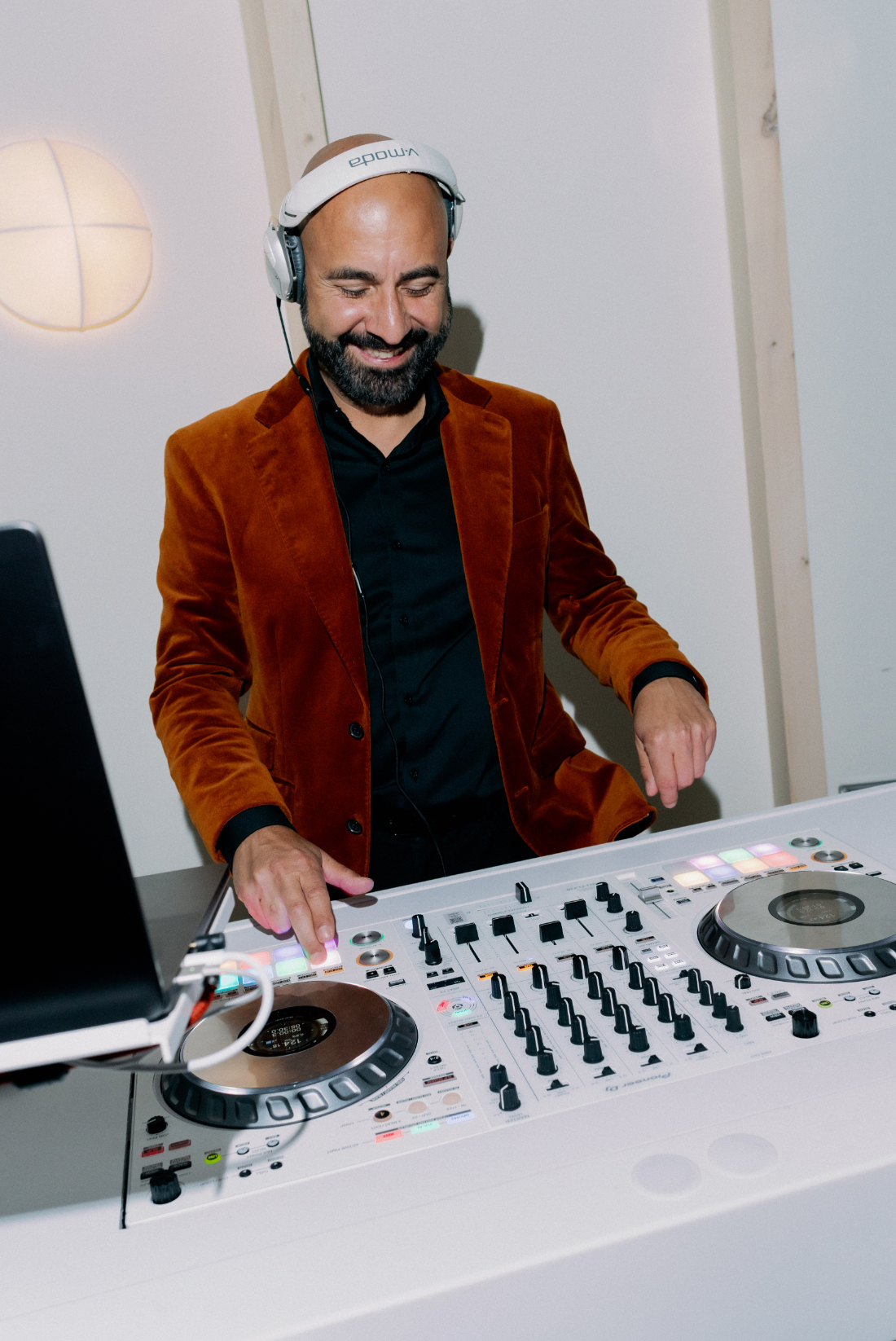 Wedding after party ideas featuring a DJ providing music and entertainment for the late-night celebration.