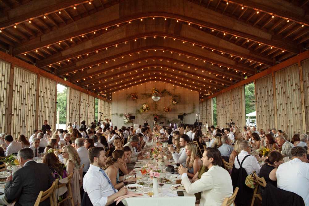 Elegant barn wedding reception showing how expert coordination helps minimize wedding planning stress for couples.
